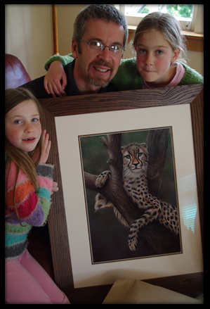 The Hansen family with a surprise birthday present for Glenn!